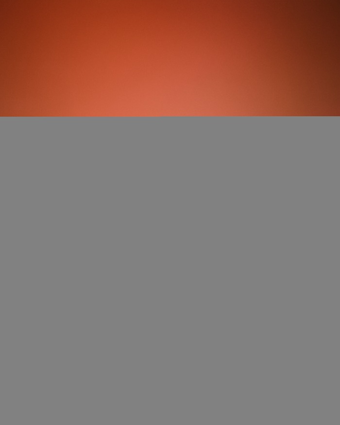 Side view of Anthony Edwards' black and purple adidas sneakers.